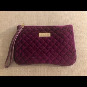 Bebe velvet purple clutch with gold trim. Like new!